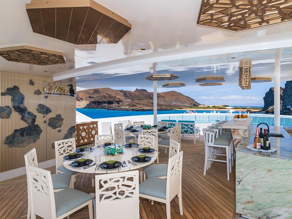 Outdoor dining on the Elite Galapagos catamaran