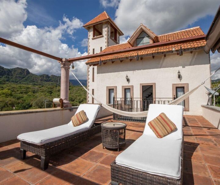 Outdoor sun loungers at Hotel Casa Isabella