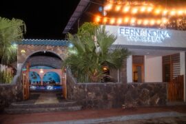 Illuminated entrance to the Fernandina Hotel