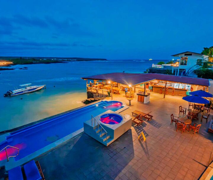 Night view of the pool at the Solymar Galapagos Hotel