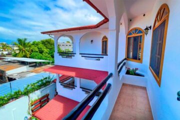 balcony with city view at Galapagos Suites