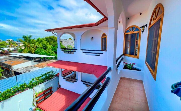 balcony with city view at Galapagos Suites