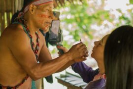 painting women's faces in Shuar culture