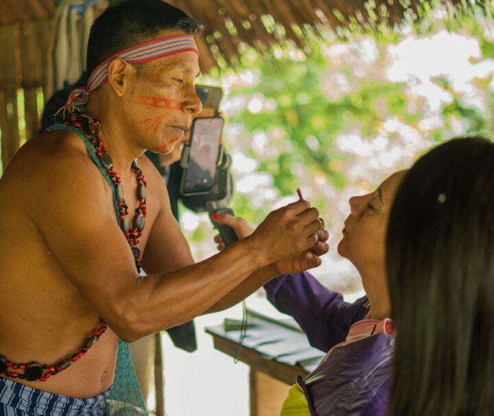 painting women's faces in Shuar culture